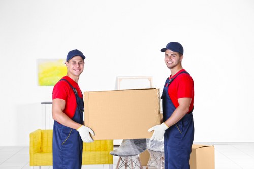 Professional local removals in Norwoodgreen with moving van and packed boxes