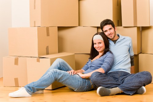Packed boxes and organized apartment move in Norwoodgreen